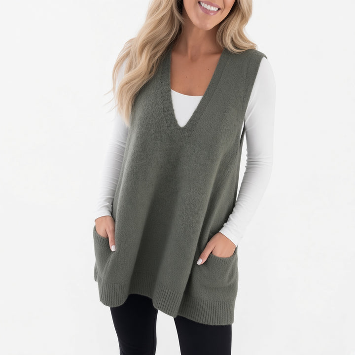 The Elara longline pocket sweater vest in Dark Green, front view