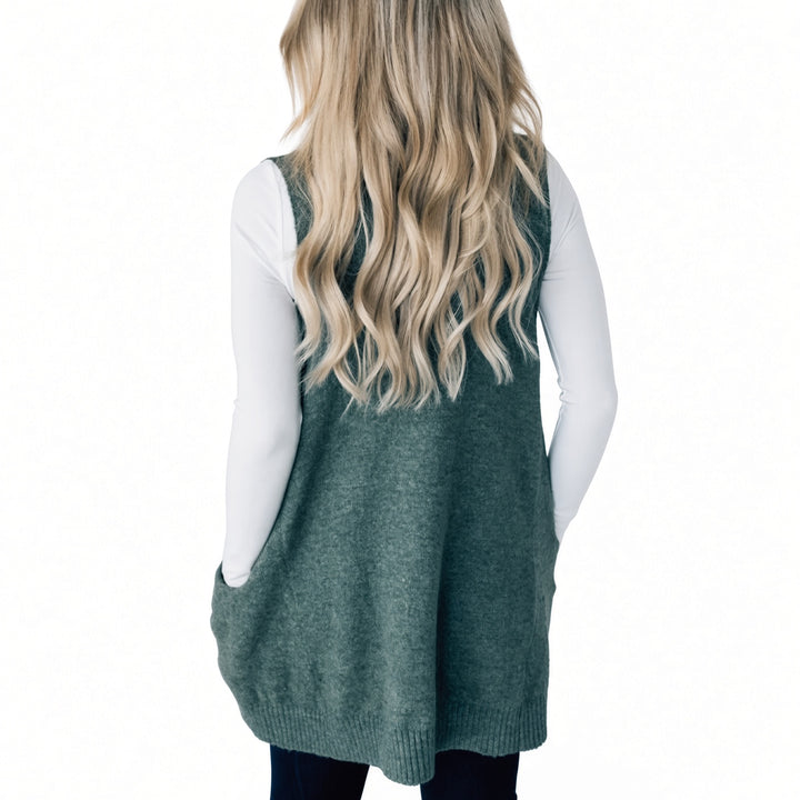 The Elara Dark Green longline pocket sweater vest, back view