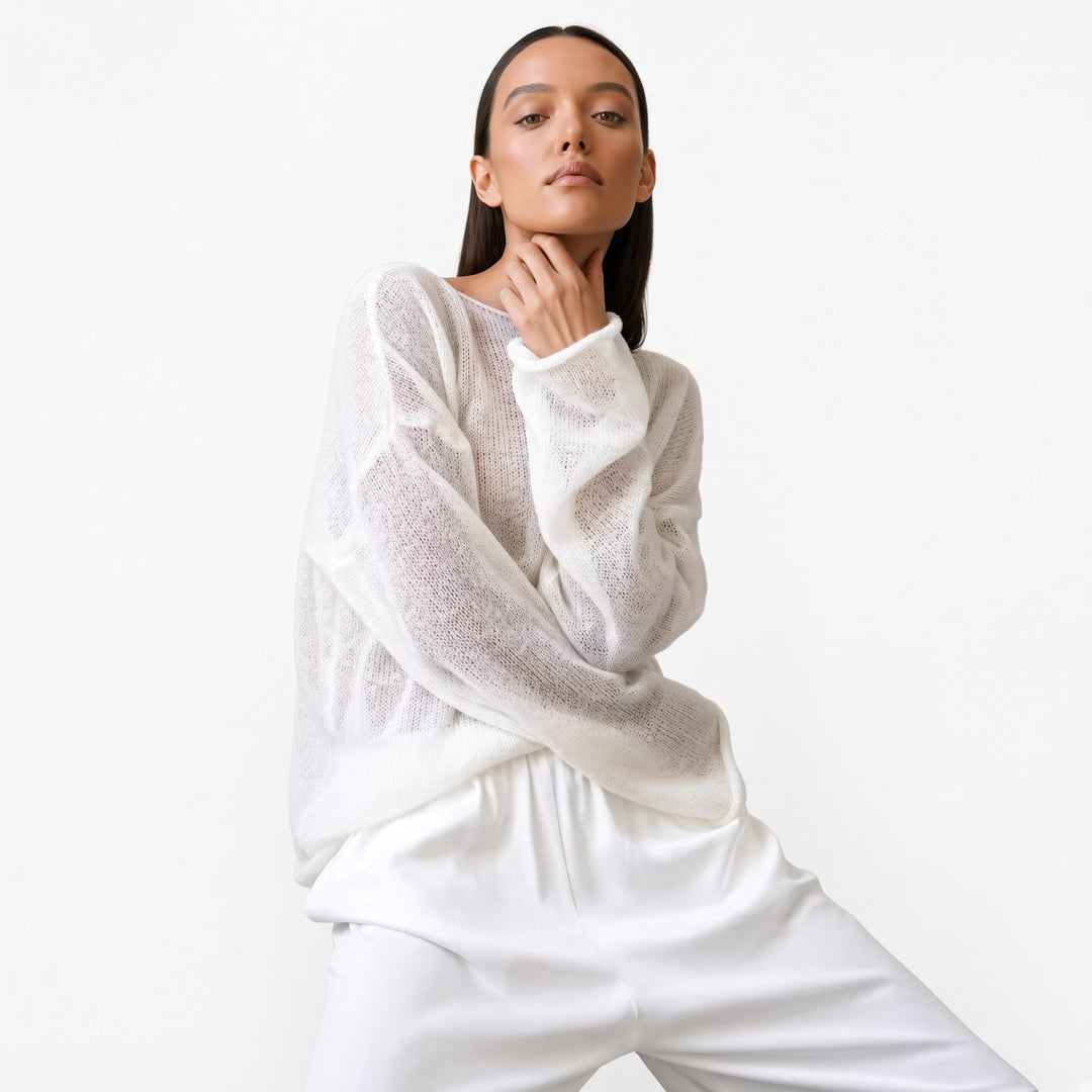 The Elara sheer knit cover-up top in White, front view