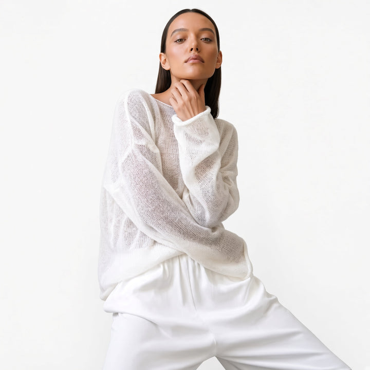 The Elara sheer knit cover-up top in White, front view