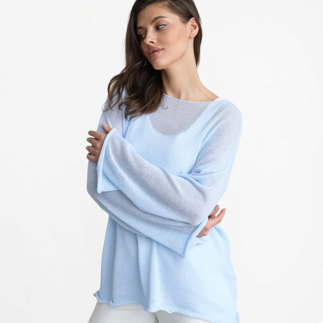 The Elara sheer knit cover-up top in Sky Blue, front view