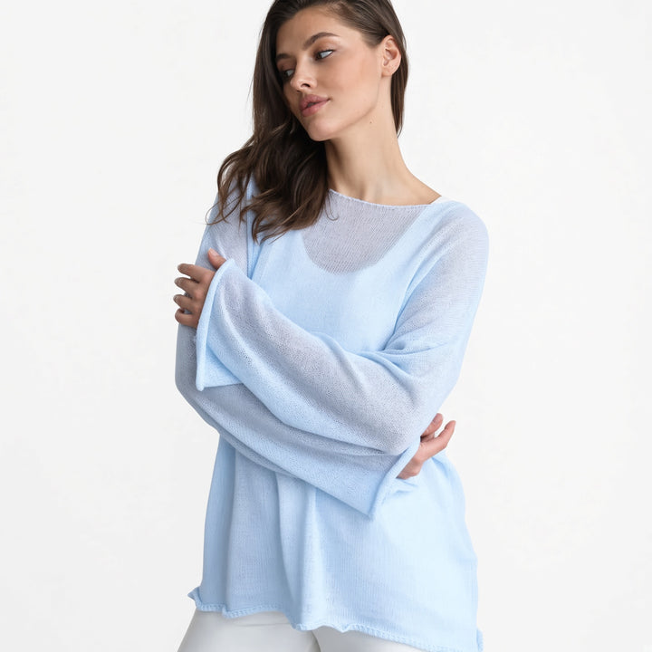 The Elara sheer knit cover-up top in Sky Blue, front view