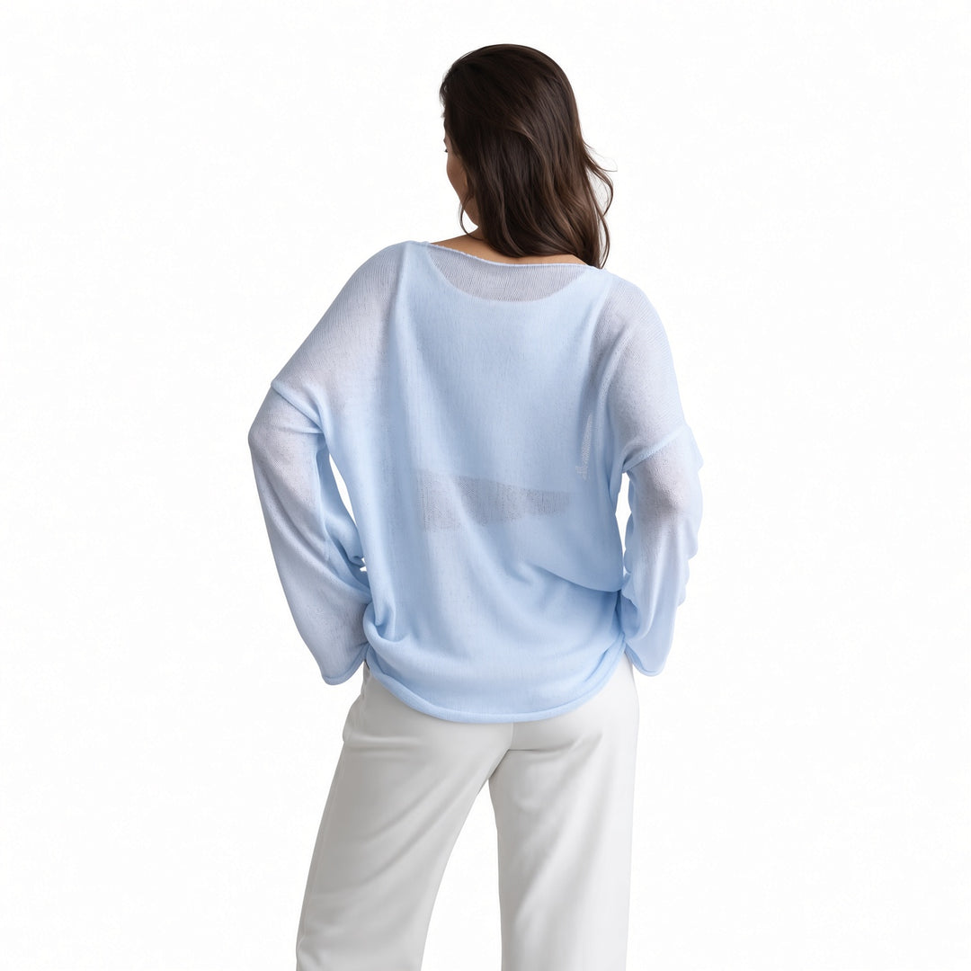 The Elara sheer knit cover-up top in Sky Blue, back view
