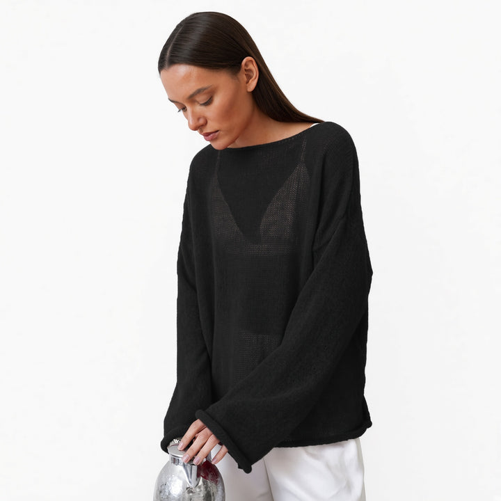 The Elara sheer knit cover-up top in Black, front view