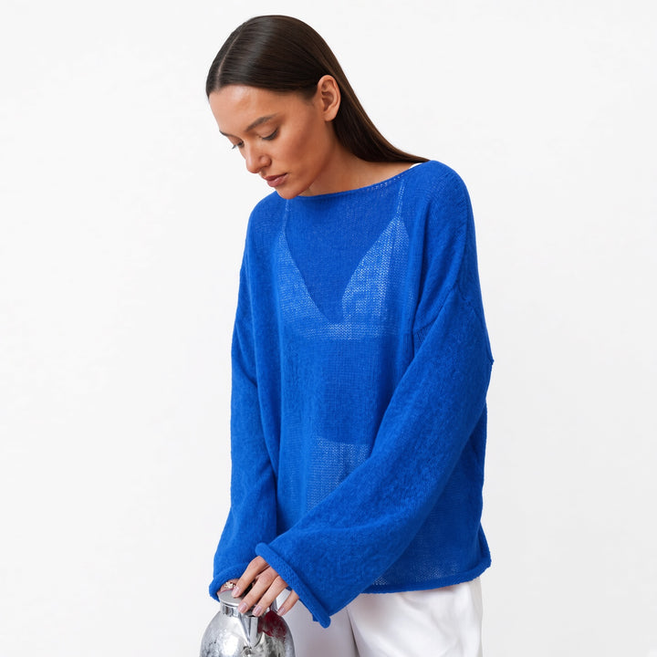 The Elara sheer knit cover-up top in Royal Blue, front view