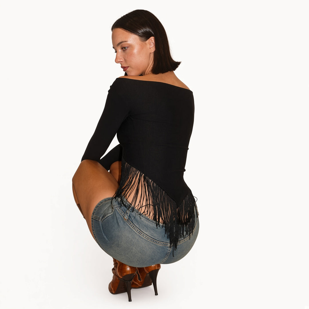 Back view of The Elara fringe-trim off-shoulder top in Black