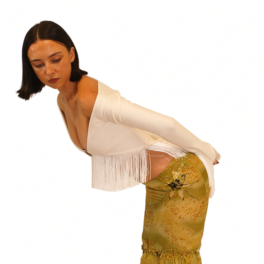 The Elara White fringe-trim off-shoulder top, side view