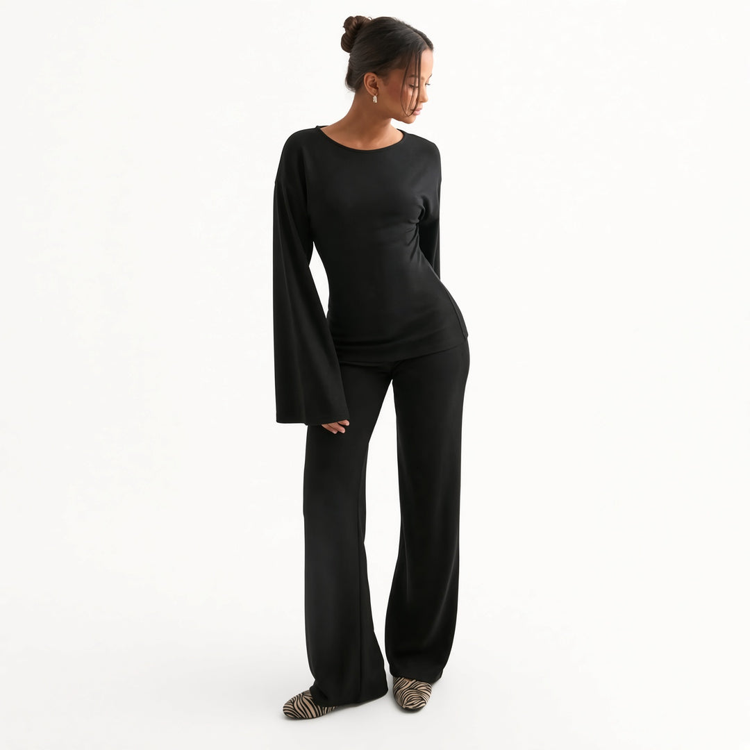 The Elara bell-sleeve flare-pant set in Black, front view