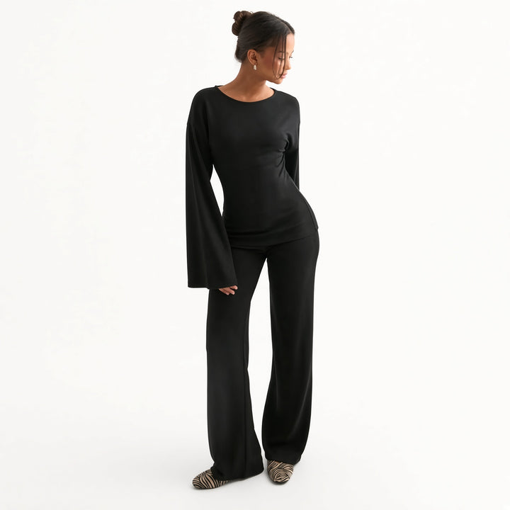 The Elara bell-sleeve flare-pant set in Black, front view