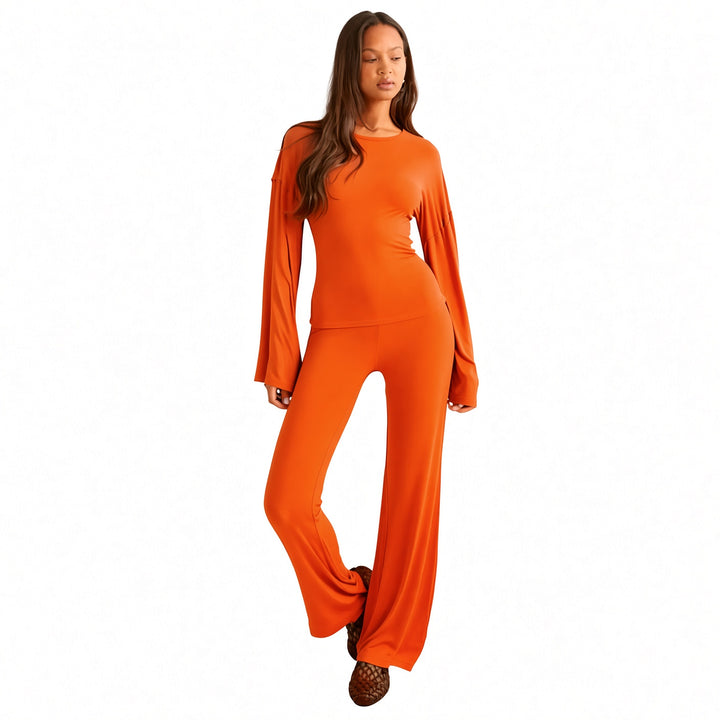 The Elara bell-sleeve flare-pant set in Orange, front view