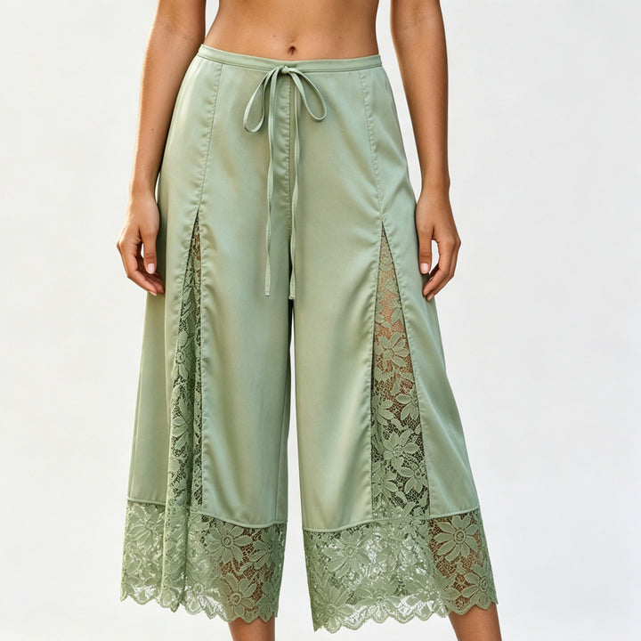 The Elara Green lace-panel satin culottes, Long length front view
