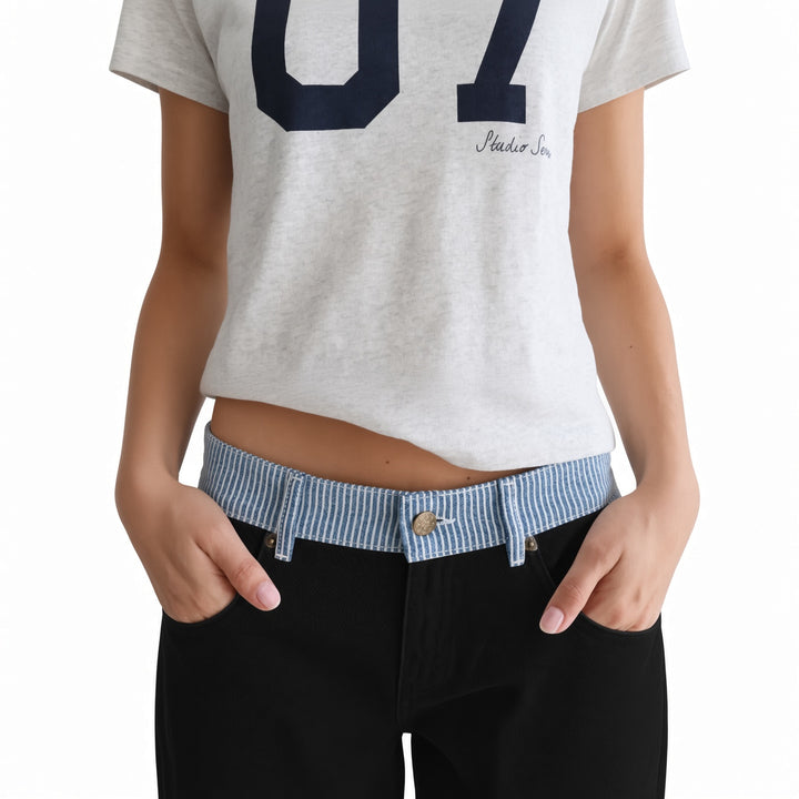 Contrast striped waistband and front pocket detail on The Elara Black pants