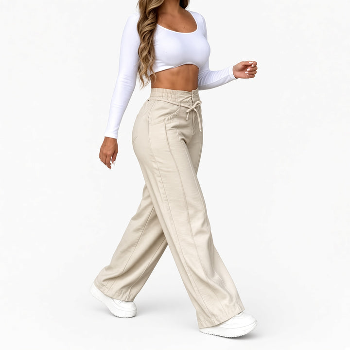 The Elara Apricot drawstring wide-leg pants, front view