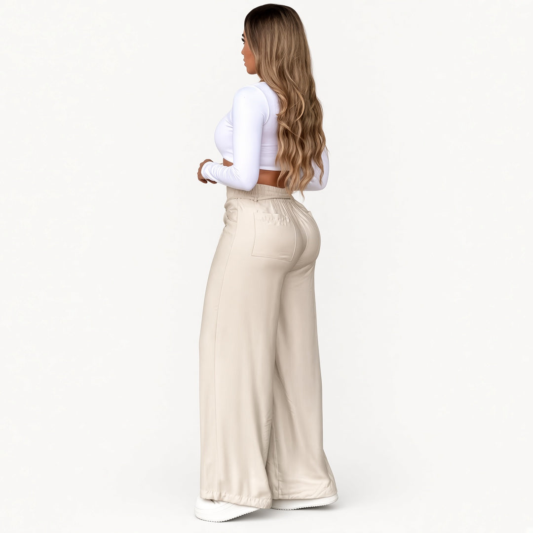 Back view of The Elara Apricot drawstring wide-leg pants