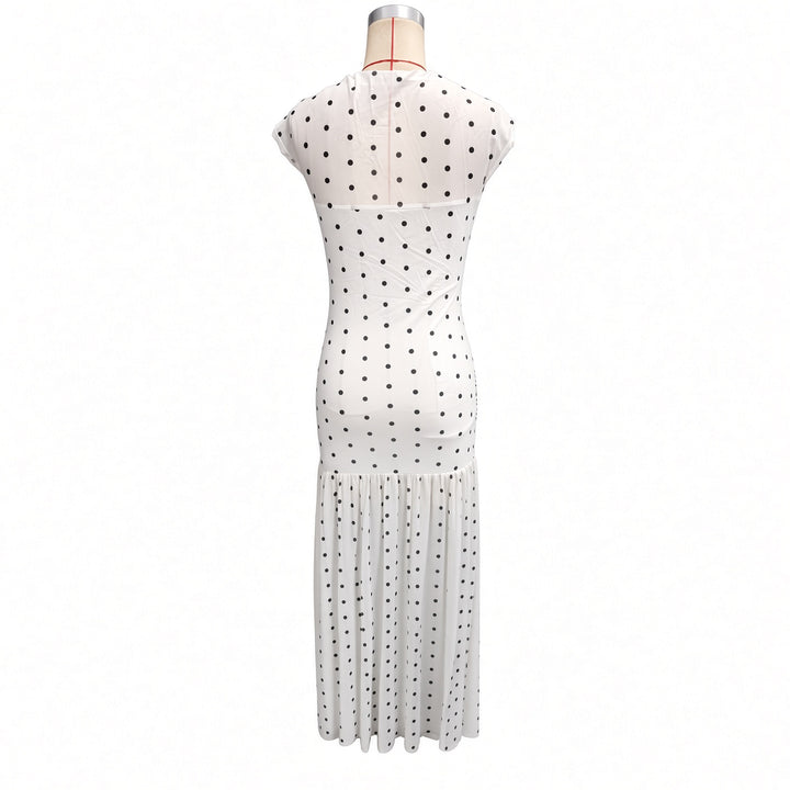 Isolated back view of the white polka-dot maxi dress