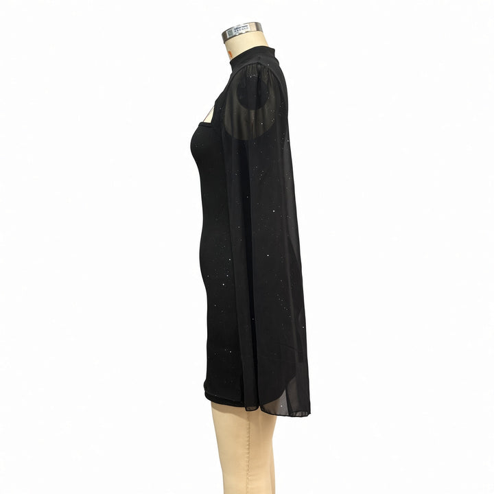 Side view showing the split chiffon cape