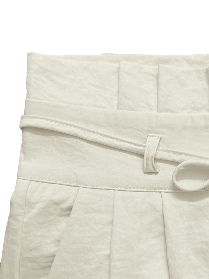 Close view of the coordinating waist tie and belt loop construction