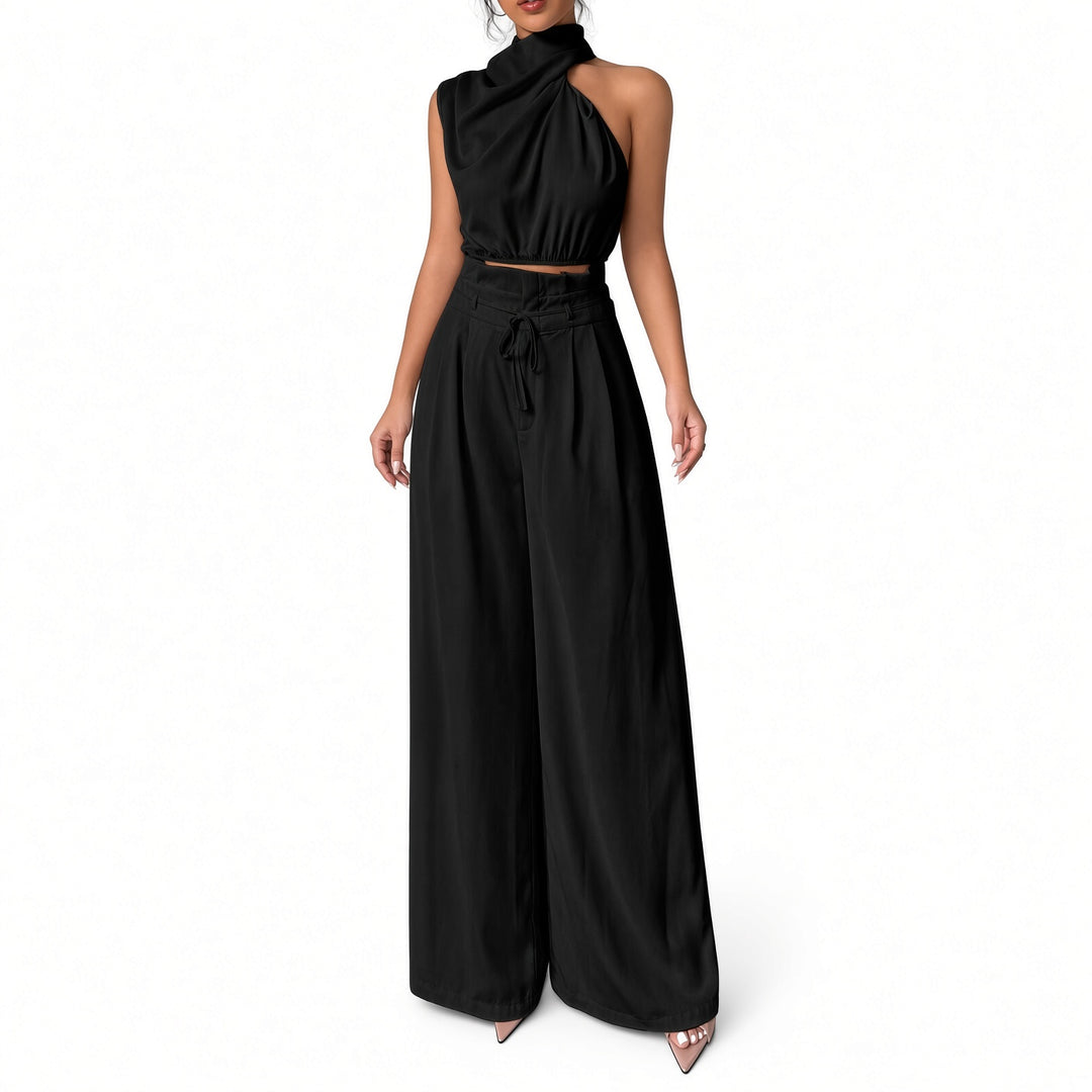 Black draped one-shoulder crop-top and wide-leg pant set, front view