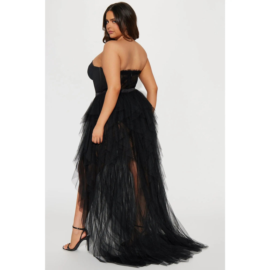 Back view of the Black layered mesh maxi dress and sweeping train