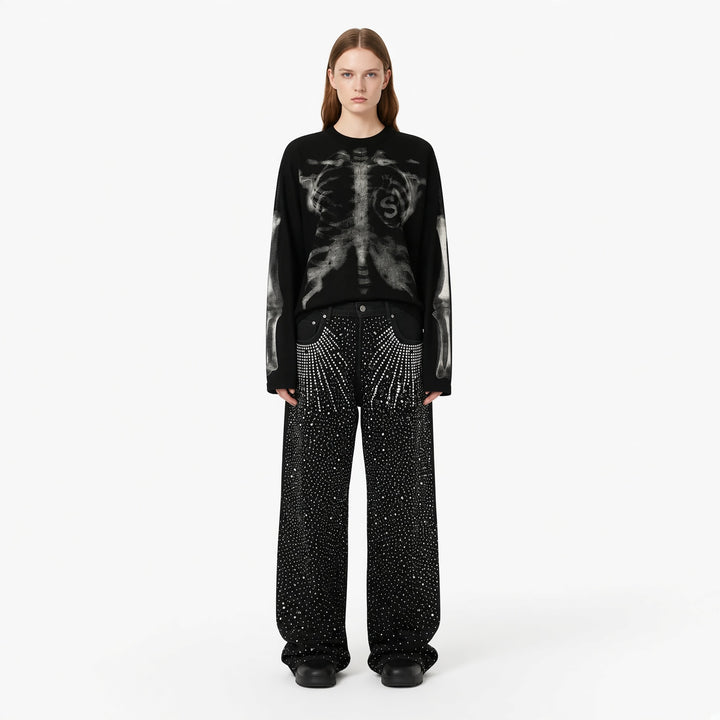 Black skeleton graphic knit sweater on a woman, front view