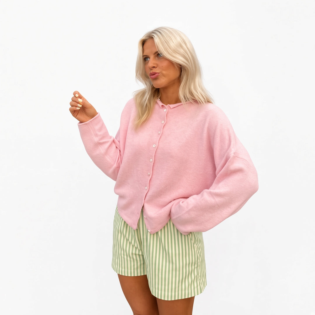 Pink rolled-edge knit cardigan, front view