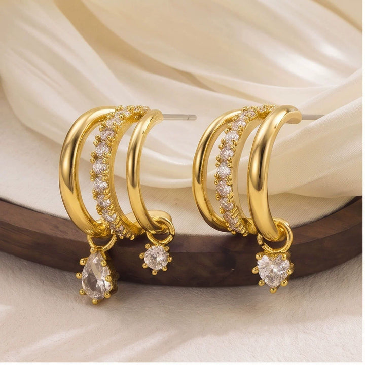 Gold-tone asymmetric cubic zirconia earring pair