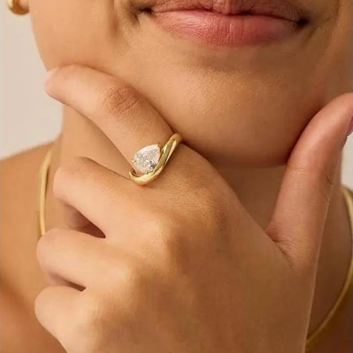 Pear-cut cubic zirconia ring lifestyle closeup