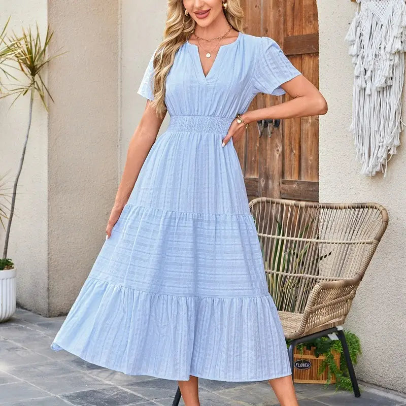 The Elara V-Neck Smocked Waist Tiered Maxi Dress
