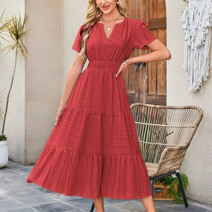 The Elara V-Neck Smocked Waist Tiered Maxi Dress