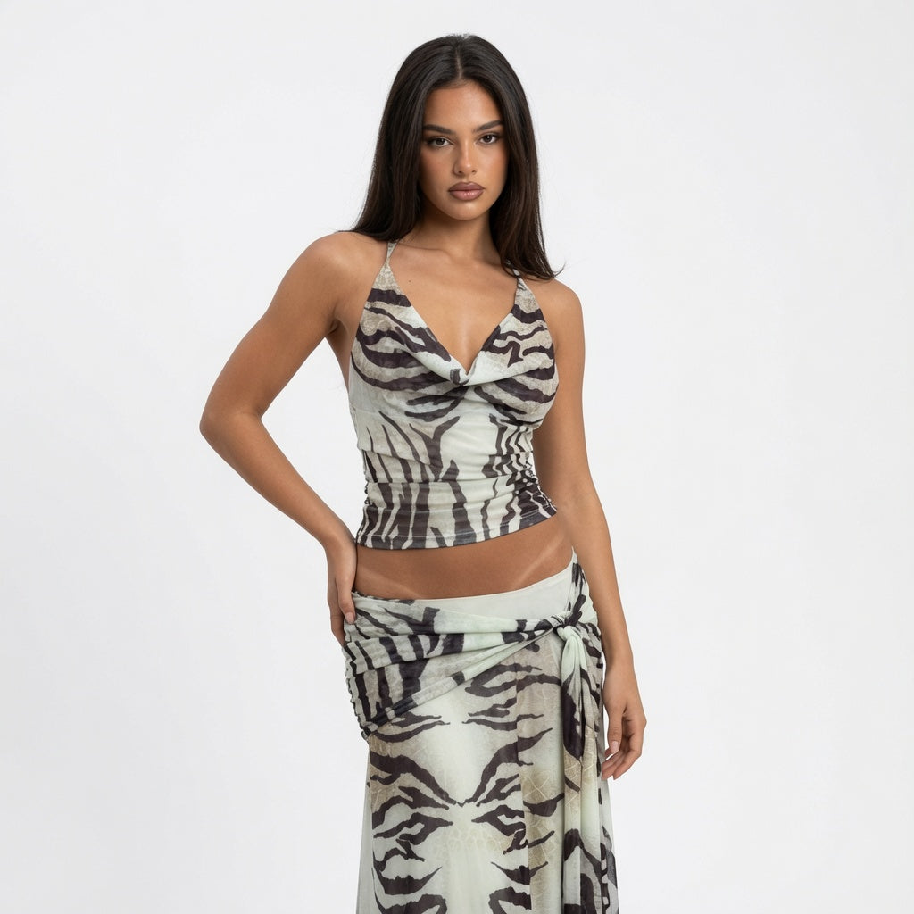 The Elara Zebra Muse Backless Maxi Dress