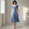 The Elara Flutter Sleeve Sweetheart Midi Dress