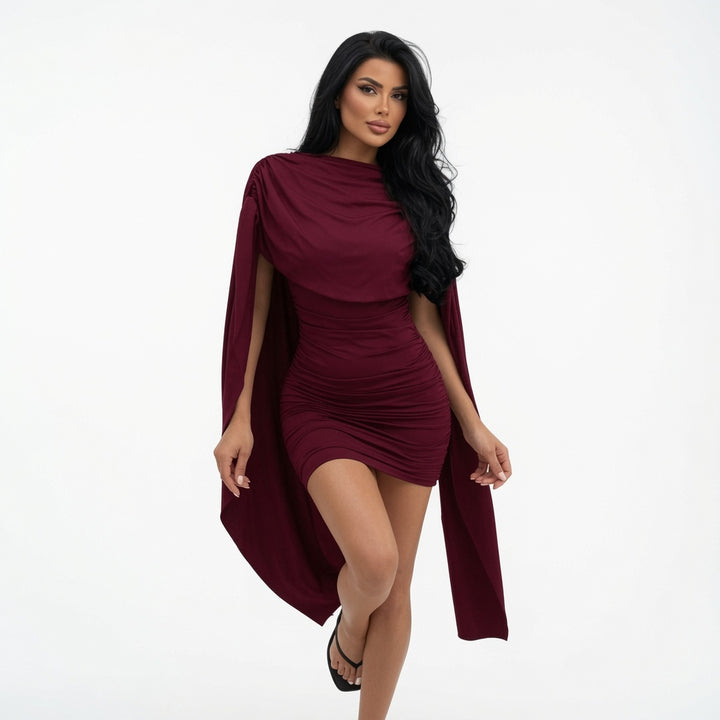 The Elara Pleated Cape-Overlay Mini Dress