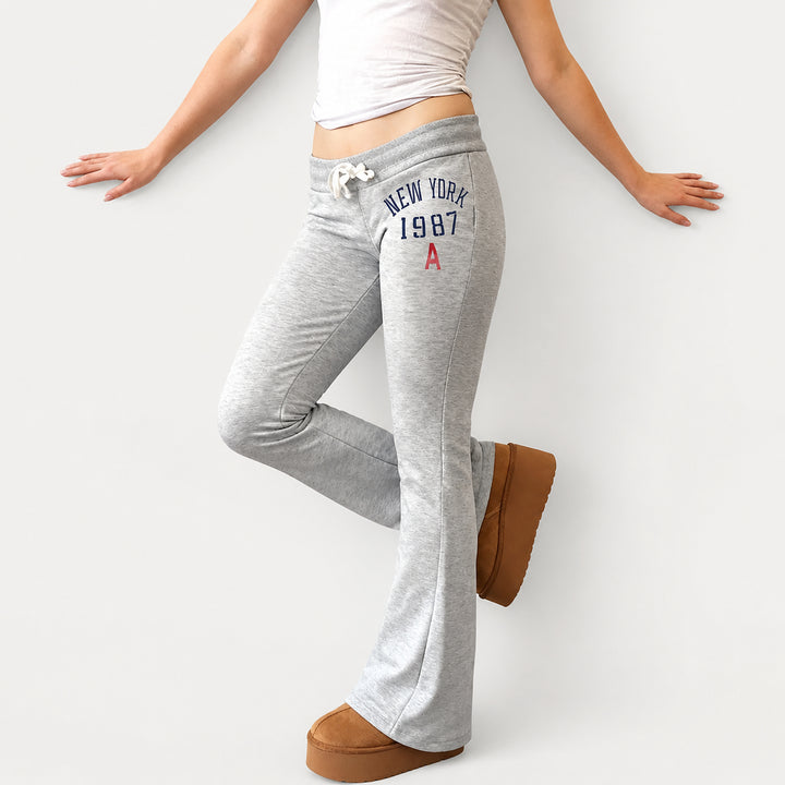The Elara Low-Rise Graphic Drawstring Flare Pants in Grey, side view
