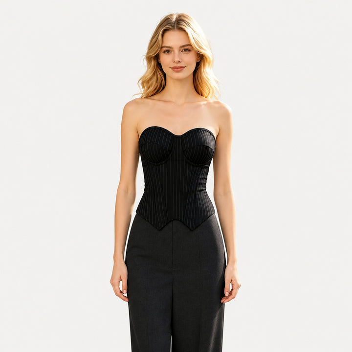 The Elara Underwire Pointed-Hem Corset Top in Black Pinstripe, model front view