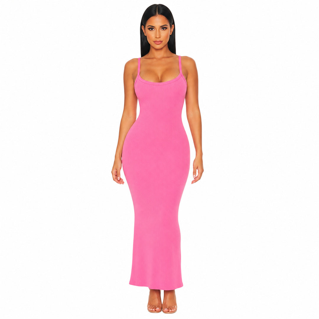 Pink ribbed bodycon maxi dress on female model, studio front view