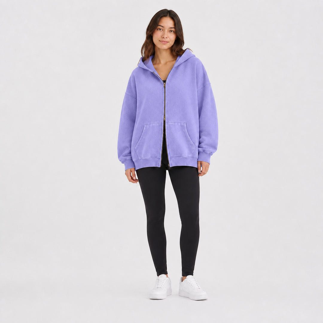 Lavender oversized double-zip hoodie on female model, studio front view