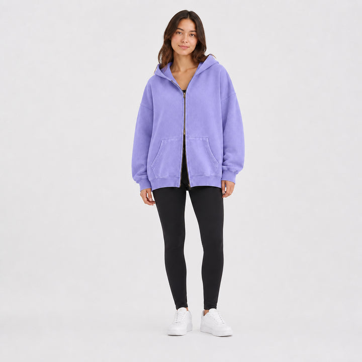 Lavender oversized double-zip hoodie on female model, studio front view