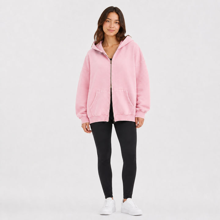 Lotus oversized double-zip hoodie on female model, studio front view