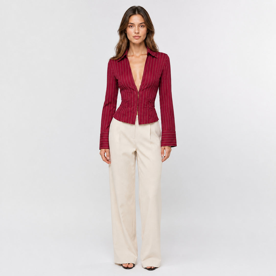 Wine red hook-front striped blouse on female model, studio front view