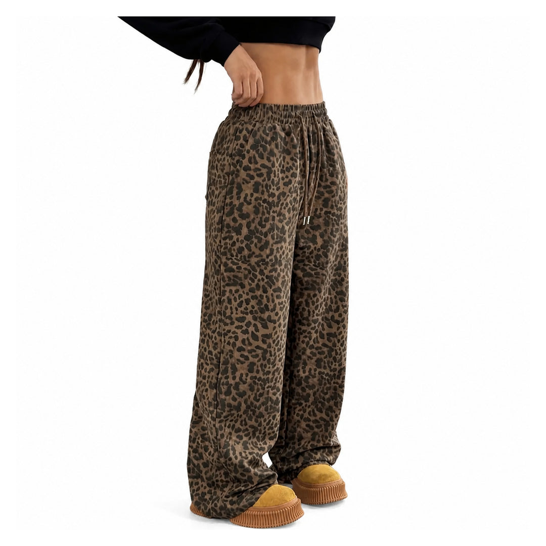 The Elara Relaxed Leopard Wide-Leg Pants in dark brown, three-quarter view