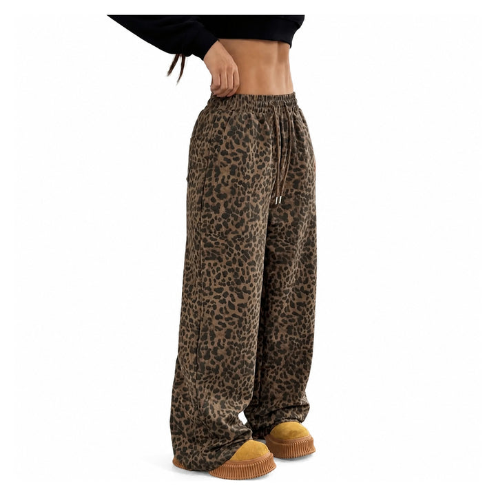 The Elara Relaxed Leopard Wide-Leg Pants in dark brown, three-quarter view