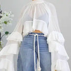 The Elara Tiered Ruffle Sheer Mesh Long Sleeve Top